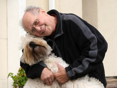 senior man and dog
